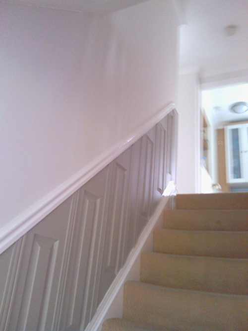 AFTER PAINTING THE CEILING AND WALLS WHITE, PAINTED THE WOOD PANELLING IN THIS LOVELY GREY COLOUR