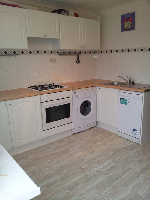  KITCHEN MAKE OVER, NEW TOPS, SINK AND TAPS WITH NEW LAMINATE FLOORING.