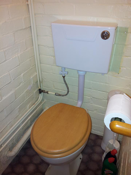  NEW PLASTIC CISTERN FITTED IN AN OUT SIDE TOILET